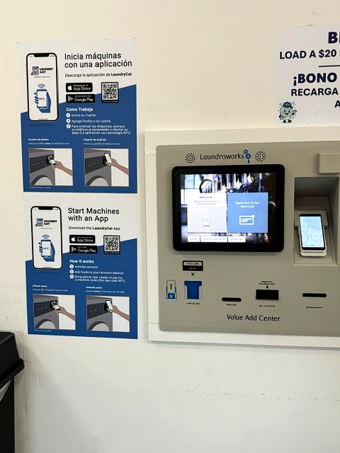 Value Add Center kiosk — pay by card or start machines with the LaundryCat app
